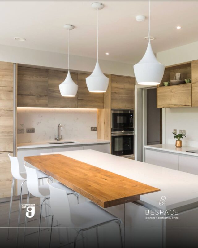 Bright, minimal and functional 🔆

This kitchen pairs crisp white cabinetry with warm wood accents, creating a space that feels both modern and inviting. The island doubles as a breakfast bar with integrated seating and a built-in wine cooler. Seamlessly connected, the utility room carries the same thoughtful design keeping the everyday essentials organised 🙌

Designed for real living, with style in every corner. Visit our showrooms or book your consultation to start your own transformation today | Link in bio