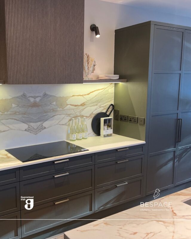 Where moody meets marble 🌿✨

This kitchen perfectly balances deep forest green cabinetry with the striking veining of book-matched quartz. The seamless flow from the prep zone to the fireside lounge makes this the ultimate heart of the home.

Thinking of your dream kitchen living area? Think BeSpace | Link in bio